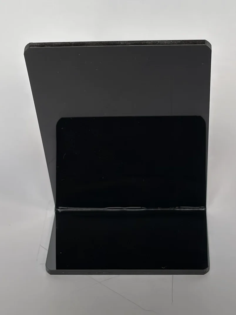 The back of the tap stand in Noir, showing the foot it stands on.